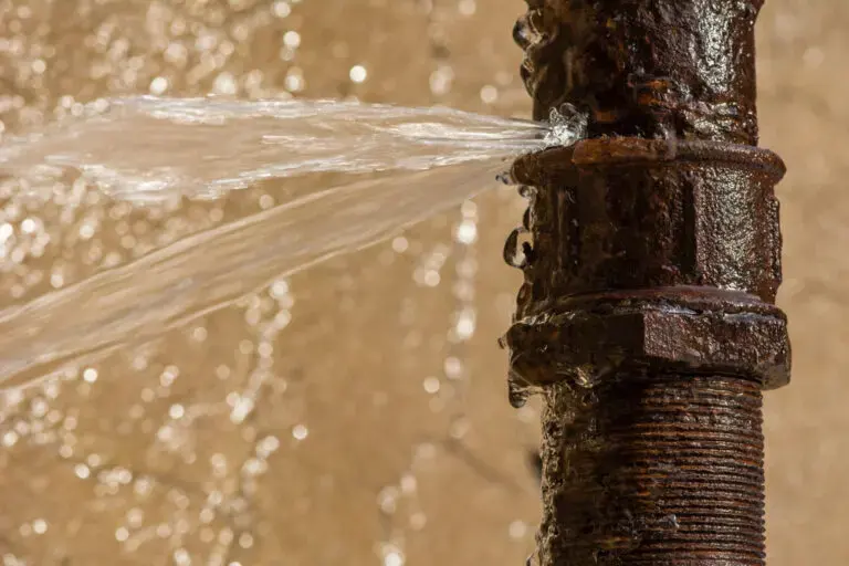 Water spraying from a failed threaded supply pipe